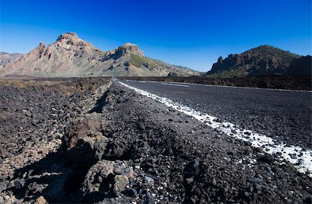 Road in lava landscape of the El Teide National Park, Tenerife, Canary Islands Foto de stock - Super Valor sin royalties y Suscripción, Código: 400-03984396