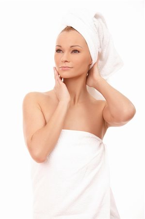 Portrait of Fresh and Beautiful brunette woman wearing white towel on her head Foto de stock - Super Valor sin royalties y Suscripción, Código: 400-03984538