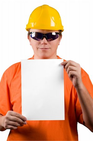 simsearch:400-04485729,k - The man in yellow helmet, orange shirt, glasses and paper a4. Add your text here. Isolated glasses, paper and background in different paths. Stock Photo - Budget Royalty-Free & Subscription, Code: 400-03985033