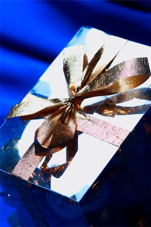simsearch:400-05177023,k - x-mas gift over deep blue background Stock Photo - Budget Royalty-Free & Subscription, Code: 400-03985068