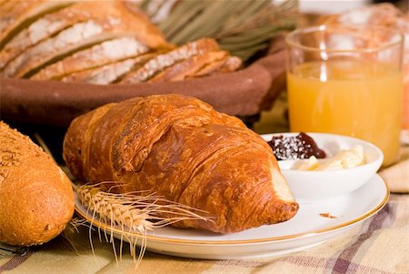 simsearch:400-03932840,k - Rustic various baked bread with orange juice Stock Photo - Budget Royalty-Free & Subscription, Code: 400-03985117