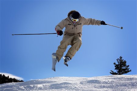 simsearch:400-04811318,k - Skier jumping at Lake Tahoe, California resort Stock Photo - Budget Royalty-Free & Subscription, Code: 400-03985157