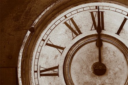 An Antique Clock Face in a brown sepia tone. Stock Photo - Budget Royalty-Free & Subscription, Code: 400-03985240