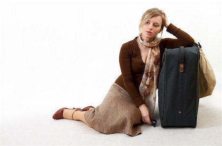 beauty woman with huge bag is standing on station, separate on white Stock Photo - Budget Royalty-Free & Subscription, Code: 400-03985537