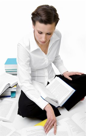 Casual student with books spread around Stock Photo - Budget Royalty-Free & Subscription, Code: 400-03986080