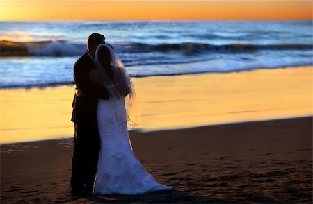 simsearch:400-08495448,k - Couple wedding on the beach at sunset Stock Photo - Budget Royalty-Free & Subscription, Code: 400-03986408
