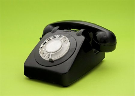 simsearch:400-03986450,k - Vintage phone in a green background Photographie de stock - Aubaine LD & Abonnement, Code: 400-03986450