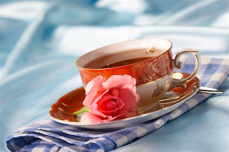 cup of tea with flower over azure Stock Photo - Budget Royalty-Free & Subscription, Code: 400-03986585