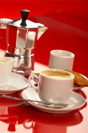 simsearch:400-07477800,k - small cup of coffee with coffee pot ober red background Fotografie stock - Microstock e Abbonamento, Codice: 400-03986583