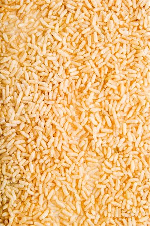 simsearch:400-03986789,k - Bulk whole grain instant cooking rice background texture Photographie de stock - Aubaine LD & Abonnement, Code: 400-03986785