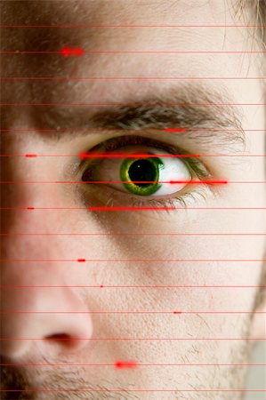 eye laser beam - An iris scan concept image of a male with a few days beard growth (in regular color) Foto de stock - Super Valor sin royalties y Suscripción, Código: 400-03986827