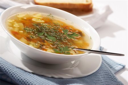 soup and crackers - macro picture of appetizing vegetable soup decorated  parsley and  fennel Stock Photo - Budget Royalty-Free & Subscription, Code: 400-03986845