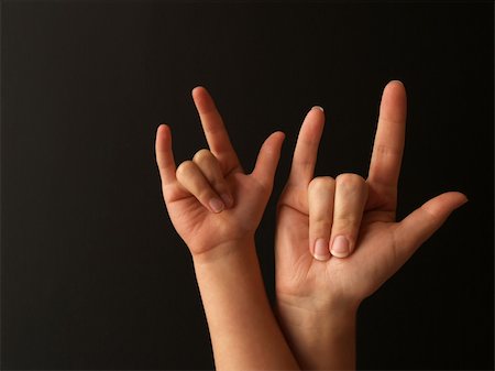 sparkia (artist) - a mother and her child doing sign language for I LOVE YOU Stockbilder - Microstock & Abonnement, Bildnummer: 400-03986910