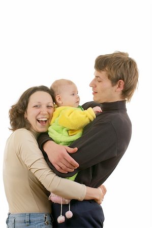 happy family smiling and hugging their  baby Stock Photo - Budget Royalty-Free & Subscription, Code: 400-03986978