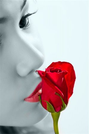 eyedear (artist) - close up of a lady kissing a rose Stock Photo - Budget Royalty-Free & Subscription, Code: 400-03987393