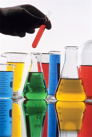 simsearch:400-05325555,k - Hand holding test tube with various colorful science glassware Stock Photo - Budget Royalty-Free & Subscription, Code: 400-03987707