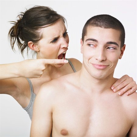 A young couple making faces Stock Photo - Budget Royalty-Free & Subscription, Code: 400-03987763