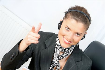 simsearch:400-04233879,k - young businesswoman or customer service at work wearing headphones Photographie de stock - Aubaine LD & Abonnement, Code: 400-03987811