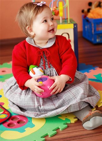 simsearch:400-04162652,k - Portrait of cute baby with toy Stockbilder - Microstock & Abonnement, Bildnummer: 400-03988059