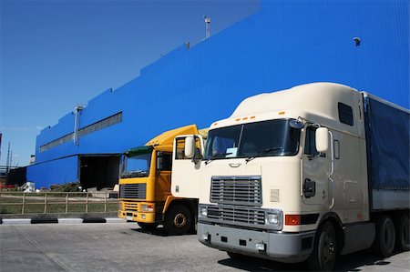 factory road - Two powerful lorries at a modern factory Stock Photo - Budget Royalty-Free & Subscription, Code: 400-03988809