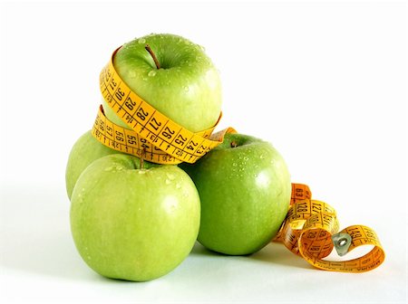 simsearch:400-03990146,k - Green apples and tape as a concept of healthy lifestyle Foto de stock - Royalty-Free Super Valor e Assinatura, Número: 400-03989239