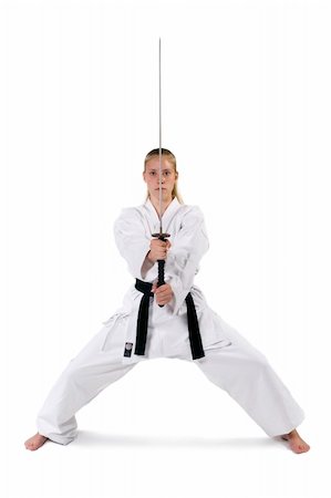 simsearch:400-04558215,k - Female Third Degree Black Belt with Katana. Photographie de stock - Aubaine LD & Abonnement, Code: 400-03989571