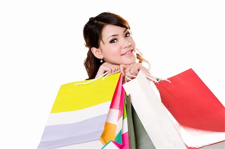 eyedear (artist) - young woman happily shopping full of paper bags Stock Photo - Budget Royalty-Free & Subscription, Code: 400-03989726