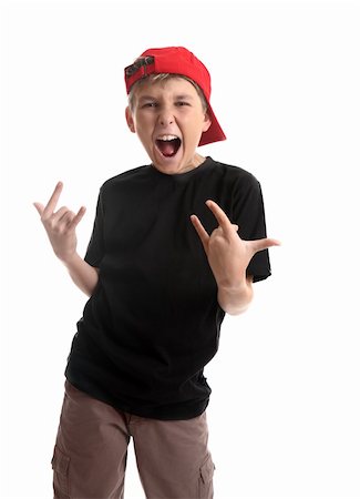 sign language kid - Revved up boy doing a typical coma hand signal which has many various unrelated meanings depending on culture but was popularised in music by a heavy metal band to symbol  rock n roll.  Source of facts,  wikipedia Stock Photo - Budget Royalty-Free & Subscription, Code: 400-03989754