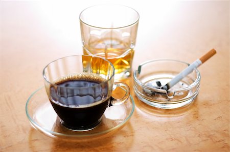 Three dangerous items: coffee, cigarette (smoking) and alcohol Stock Photo - Budget Royalty-Free & Subscription, Code: 400-03989813