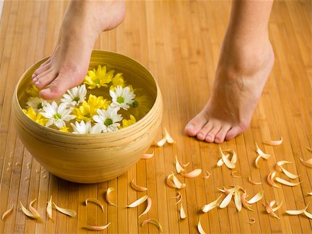 smelling feet - feet near a basin with flowers and water Stock Photo - Budget Royalty-Free & Subscription, Code: 400-03983454