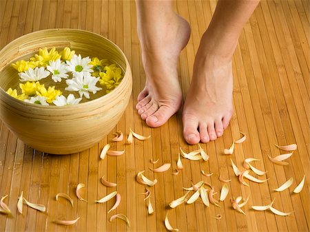 smelling feet - feet near a basin with flowers and water Stock Photo - Budget Royalty-Free & Subscription, Code: 400-03983455