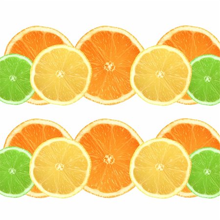 Lemon, lime and orange citrus fruit slices in two horizontal lines and set against a white background. Stock Photo - Budget Royalty-Free & Subscription, Code: 400-03983845