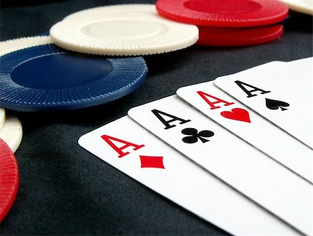 sparkia (artist) - poker chips and a dealer button Stockbilder - Microstock & Abonnement, Bildnummer: 400-03994017