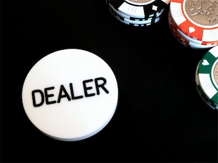 poker chips and a dealer button Stock Photo - Budget Royalty-Free & Subscription, Code: 400-03994020