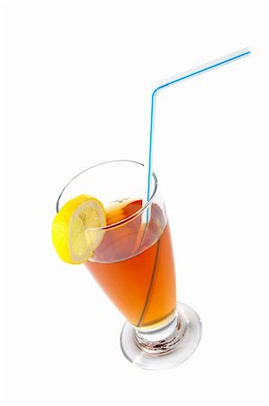 simsearch:859-03038065,k - A tumbler of tea with a straw and the slice of lemon. Shallow dof Photographie de stock - Aubaine LD & Abonnement, Code: 400-03994172