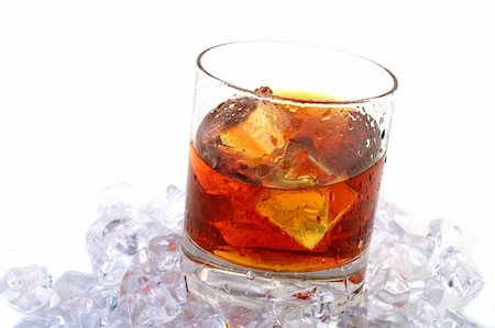 simsearch:400-03979160,k - glass of whiskey with ice cubes on white background Stock Photo - Budget Royalty-Free & Subscription, Code: 400-03994407