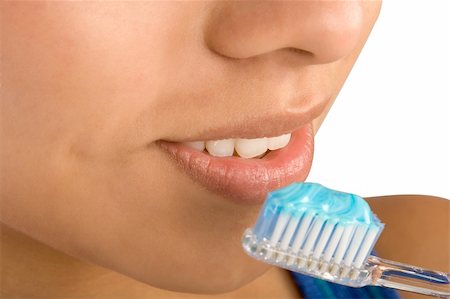 simsearch:400-04007612,k - Close up of woman brushing her teeth Stock Photo - Budget Royalty-Free & Subscription, Code: 400-03995390