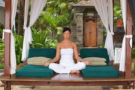simsearch:400-07615290,k - 20-25 years woman portrait during yoga at exotic surrounding, bali indonesia Stock Photo - Budget Royalty-Free & Subscription, Code: 400-03995773