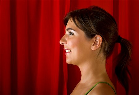 simsearch:400-04869308,k - Beautiful young woman portrait on a red background Stockbilder - Microstock & Abonnement, Bildnummer: 400-03996291