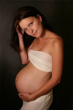 simsearch:400-05084530,k - The pregnant woman on the ninth month. The girl was born Foto de stock - Super Valor sin royalties y Suscripción, Código: 400-03996541