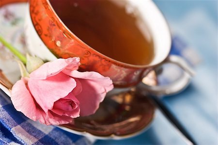 cup of tea with flower over azure Stock Photo - Budget Royalty-Free & Subscription, Code: 400-03997129