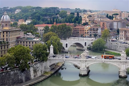 simsearch:400-07677233,k - Cityscape of Rome, taken from the top of St. Angels Castle on a hot hazy day. Stock Photo - Budget Royalty-Free & Subscription, Code: 400-03997807