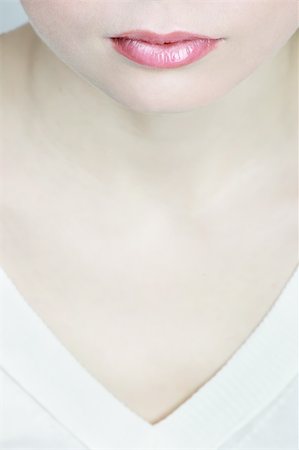 simsearch:400-04015839,k - Half face of a women, neck and pink lips Stock Photo - Budget Royalty-Free & Subscription, Code: 400-03999013