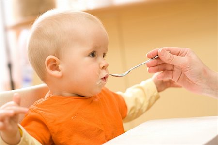 fat family eating pic - Feeding procedure of a little baby boy Stock Photo - Budget Royalty-Free & Subscription, Code: 400-03999688