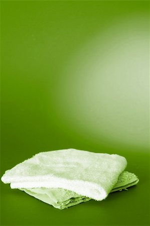 simsearch:400-06564793,k - Towels isolated on red background Photographie de stock - Aubaine LD & Abonnement, Code: 400-03999751