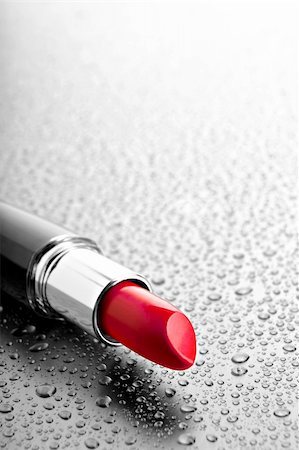 sascha (artist) - lipstick closeup on desatured water drop background Fotografie stock - Microstock e Abbonamento, Codice: 400-03999867
