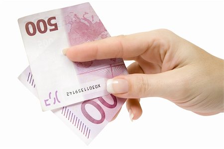 simsearch:400-05911395,k - Female hand holding a 500 Euro banknote. Isolated on a white background. Stockbilder - Microstock & Abonnement, Bildnummer: 400-03999895