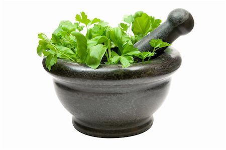 Basil and mint in a stone mortar. Isolated on a white background. Stock Photo - Budget Royalty-Free & Subscription, Code: 400-03999890