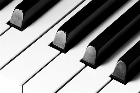 simsearch:400-06328893,k - Close up of Piano Keys Foto de stock - Super Valor sin royalties y Suscripción, Código: 400-03990007