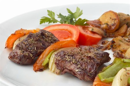 special diet - kebab served with grilled vegetables on white plate, selective focus Stock Photo - Budget Royalty-Free & Subscription, Code: 400-03990066